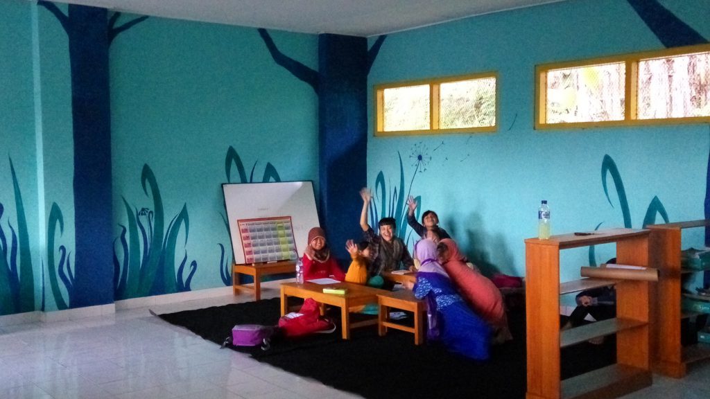 Before and after: from dead, abandoned space to amazing classroom jungle.